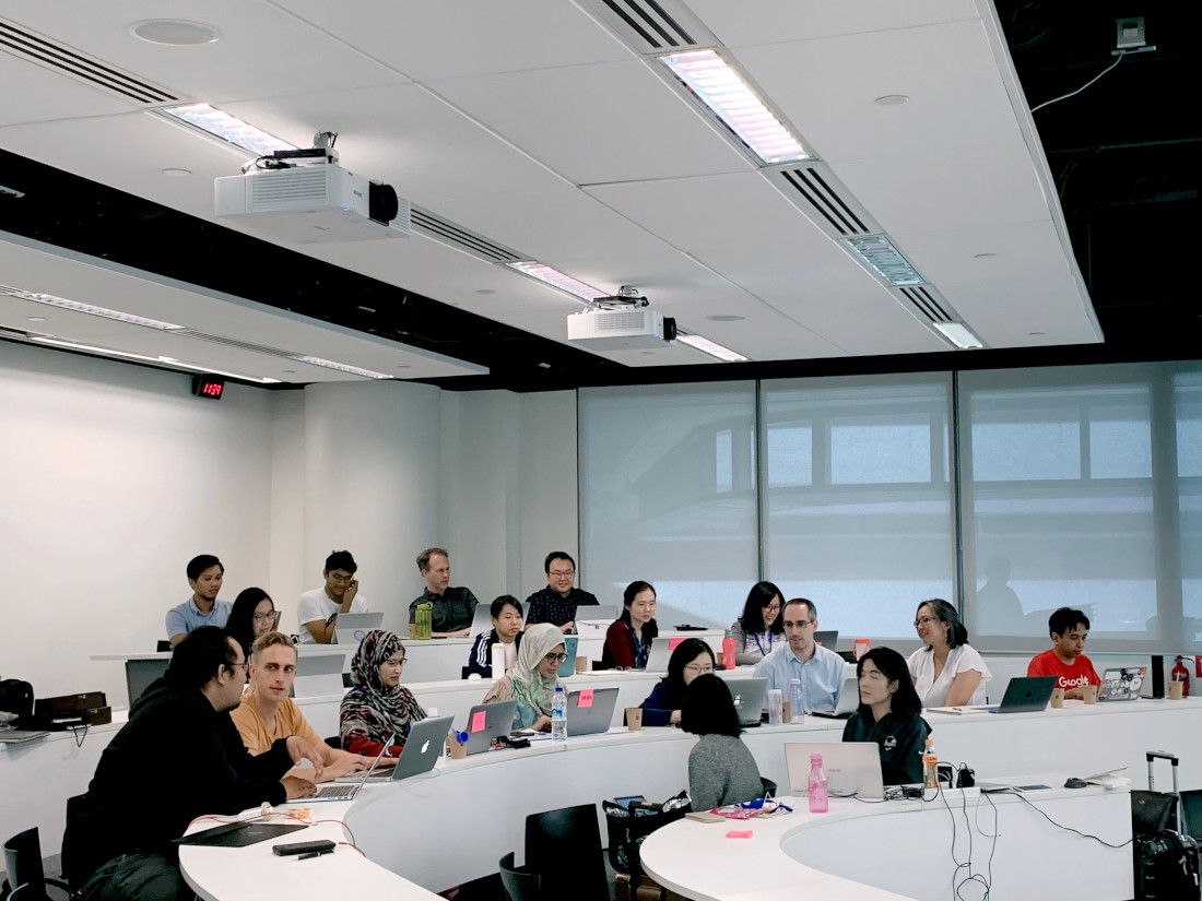 People participating in a groupwork exercise during a course